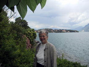 Carol with flowers and lake