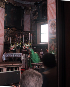 Priest celebraqting mass