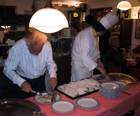 Owner & Chef filet orada baked in salt for 20