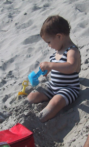 Josie digging in sand